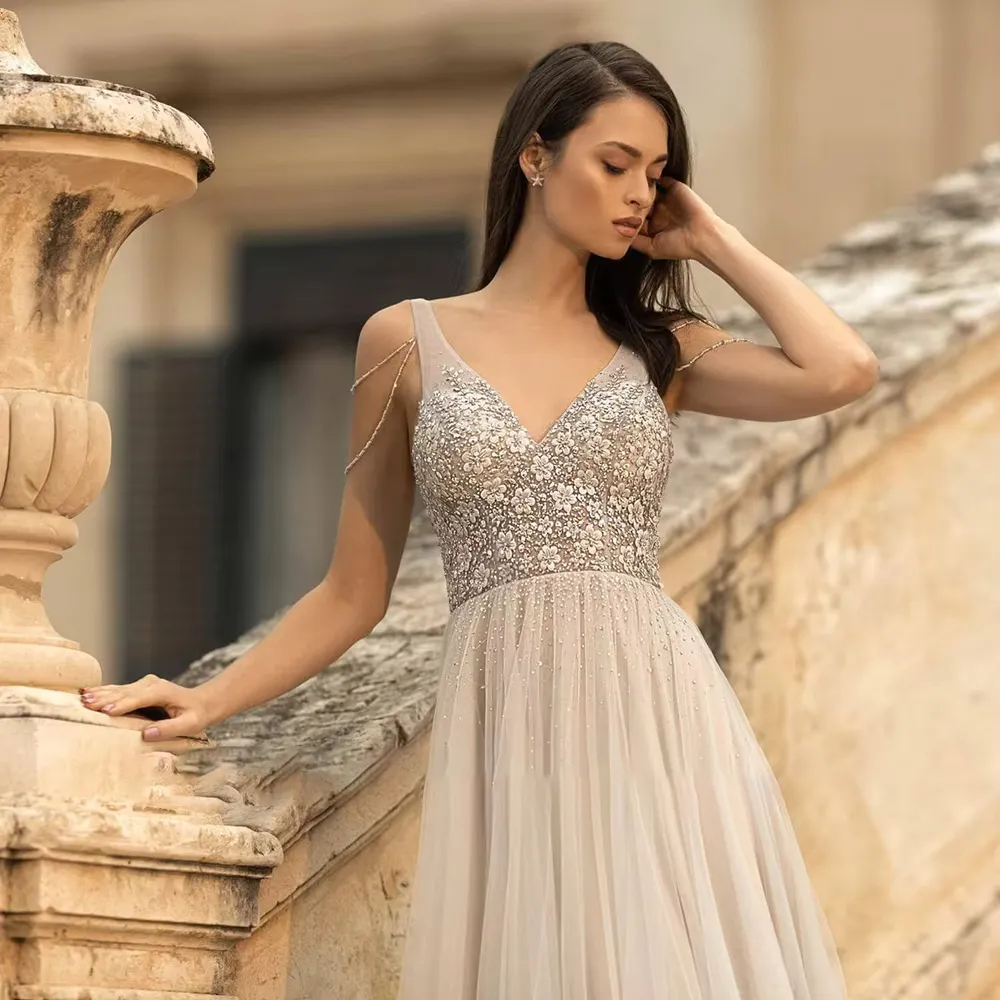 Elegant V-Neck A-Line Off the Shoulder Wedding Dress with Crystal Beading and Lace Details